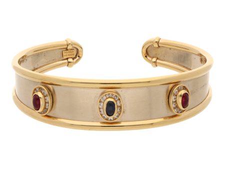 Pulsera abierta con sintéticos en oro dos tonos 14 kilates. Online Hot Sale