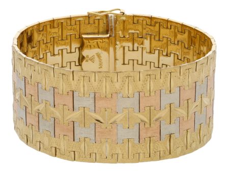 Brazalete eslabón articulado en oro tres tonos 18 kilates. Online Sale