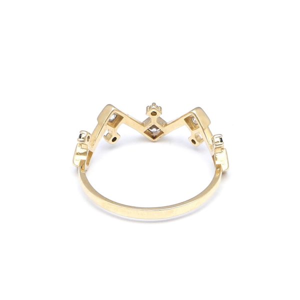 Anillo estilizado con circonias y sintéticos en oro amarillo 14 kilates. Online