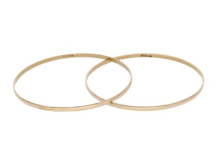 Dos pulseras de arillo lisas en oro amarillo 14 kilates. For Discount