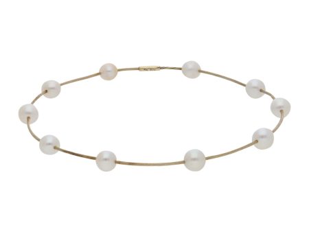 Pulsera de arillo eslabón torzal con perlas en oro amarillo 14 kilates. Supply